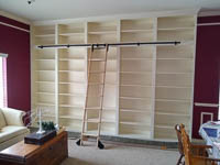 White Custom Bookcase with Rolling Library Ladder in Denton Texas