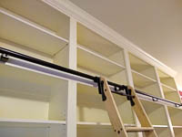 White Custom Bookcase with Rolling Library Ladder in Denton Texas