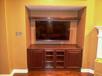 Stained Red Oak Custom Entertainment Center Cabinets in Sanger Texas