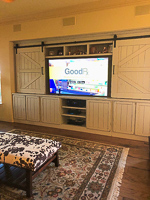 Custom Entertainment Center Cabinets with Barn Doors in Denton Texas