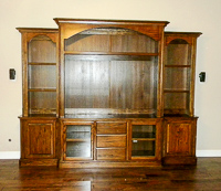 Stained Red Oak Custom Entertainment Center Cabinets with Barn Doors in Denton Texas