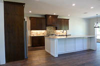 Stained Red Oak Custom Kitchen Cabinets White Island in Valley View Texas