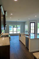 Stained Red Oak Custom Kitchen Cabinets White Island in Valley View Texas