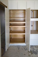 White custom Pull Out Pantry Cabinet in Lake Kiowa Texas