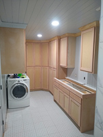 paint grade custom laundry room cabinets in Lake Kiowa Texas
