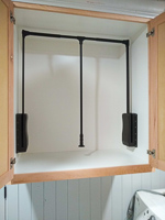 custom laundry room clothes hanging cabinet in Lake Kiowa Texas