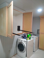 custom laundry room clothes hanging cabinet in Lake Kiowa Texas