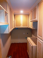 paint grade custom laundry room cabinets in Highland Village Texas