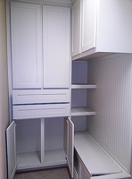 white custom laundry and mud room cabinets in Frisco TX
