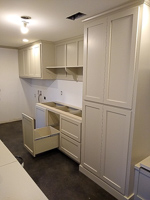 light gray custom laundry and mud room cabinets in Flower Mound Texas