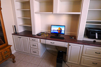 White Custom Home Office Cabinets with Stained Maple Countertop in Denton Texas