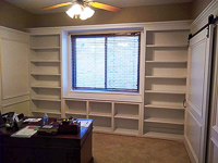 White Custom Home Office Cabinets with Sliding Door in Frisco Texas