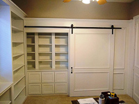 White Custom Home Office Cabinets with Sliding Door in Frisco Texas