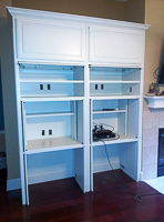 White Custom Home Office Cabinets with Pocket Doors in Flower Mound Texas
